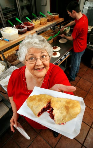 Nancy Fulton shows a cherry pie at Original Fried Pies on near Davis but they're also sold in Oklahoma City.