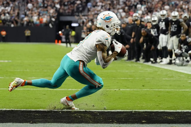 Miami Dolphins wide receiver Will Fuller (3) makes a catch for a two-point conversion against the Las Vegas Raiders during the second half of an NFL football game, Sunday, Sept. 26, 2021, in Las Vegas. (AP Photo/Rick Scuteri)