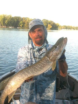 Kevin Moore, a popular area fishing guide, died Sept. 17.