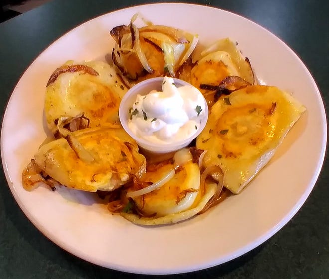An appetizer of potato and cheese perogies with grilled onions was a hit.