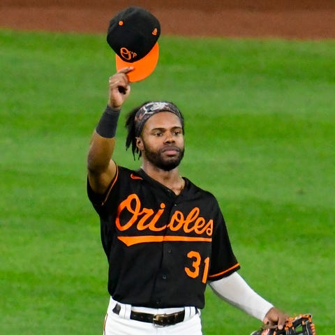 Cedric Mullins waves to the crowd at Camden Yards.