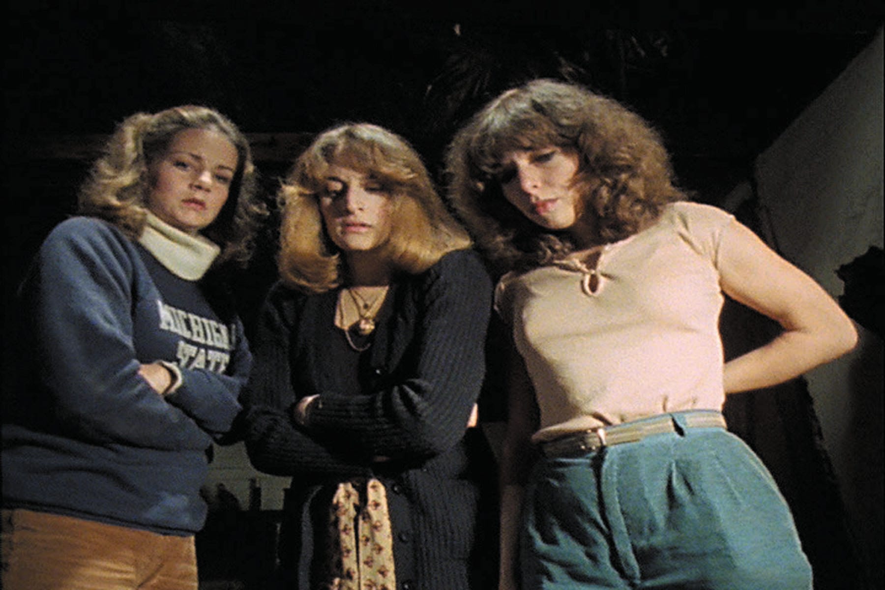 Betsy Baker, Ellen Sandweiss and Theresa Tilly in "The Evil Dead."