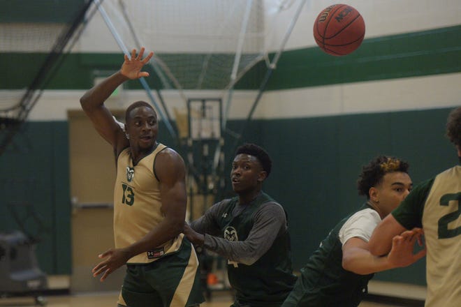 Colorado State basketball player Chandler Jacobs (13) makes a pass during practice on Tuesday, Sept. 28, 2021.