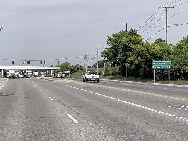 Eastbound vehicles stop beneath the U.S. Route 33 overpass at the state Route 161-Post Road interchange. A $37.6 million project to reconfigure the interchange is expected to begin this spring and be completed in 2024.