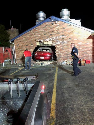 A woman lost control of her car early Wednesday morning, slamming into the side of Sylvester's North End Grille in Jackson Township. Police believe alcohol was a factor in the crash. Photo courtesy of Jackson Township Police Department