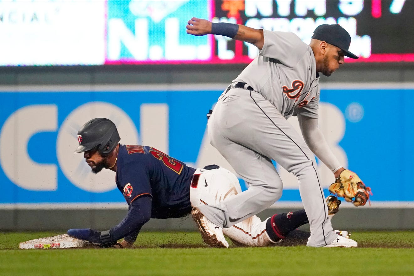 Minnesota Twins' Byron Buxton, left, steals second base on Detroit Tigers second baseman Isaac Paredes in the third inning.