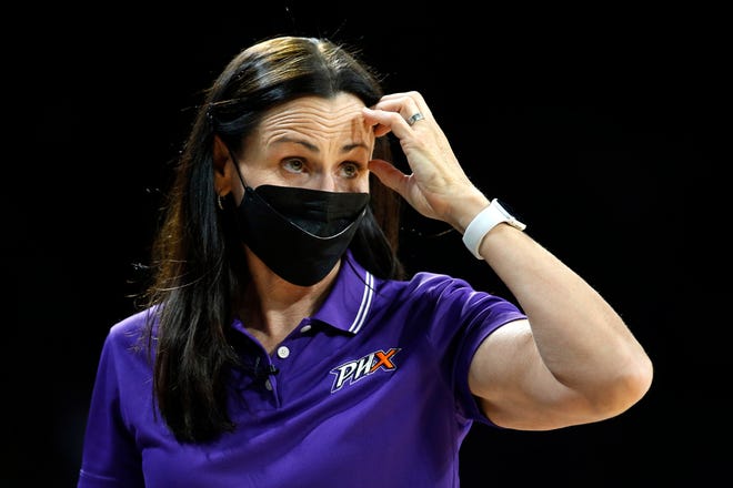 Phoenix Mercury Head Coach Sandy Brondello watches as her team plays Las Vegas Aces during the second half of Game 1 in the semifinals of the WNBA playoffs Tuesday, Sept. 28, 2021, in Las Vegas. The Aces beat the Mercury 96-90. (AP Photo/Steve Marcus)