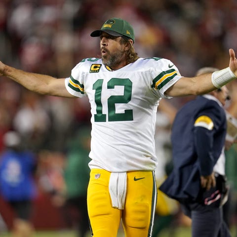 Aaron Rodgers celebrates after the Packers defeate