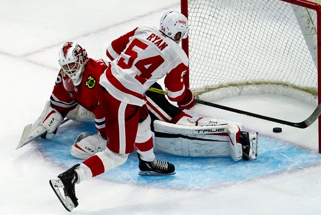 Detroit Red Wings' Bobby Ryan scores against Chicago Blackhawks goaltender Kevin Lankinen during the shootout of their NHL preseason hockey game in Chicago on Wednesday, Sept. 29, 2021. The Red Wings won 4-3.