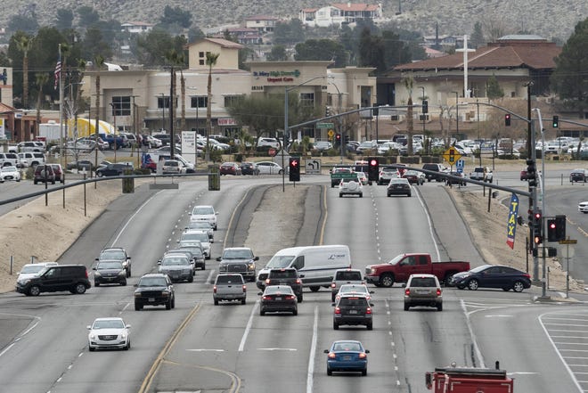 Highway 18 traffic passes through the intersection where the highway crosses Apple Valley Road in Apple Valley in 2019.