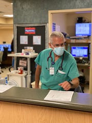 Dr. Marc Rosenthal, an emergency room physician from Grosse Pointe Park, Mich., works for the National Disaster Medical System during a coronavirus surge in late August at the Rapides Regional Medical Center in Alexandria, Louisiana.