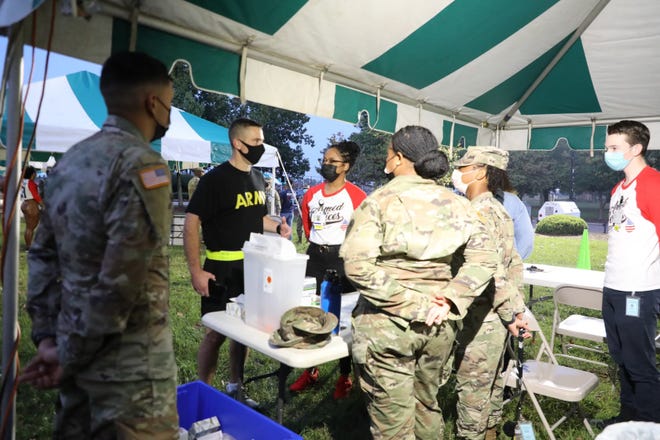 Commanding General of Fort Gordon and Cyber Center of Excellence Paul Stanton stops by a mass vaccination event at Eisenhower Medical Center on Friday morning, Oct. 1, 2021. All active duty military have to get vaccinated by Dec. 15, 2021.