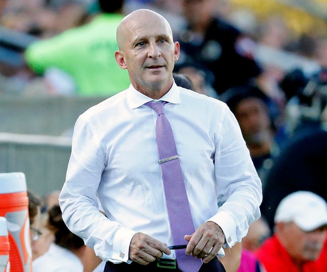 In this Oct. 27, 2019, photo, Carolina Courage head coach Paul Riley watches from the sideline during the second half of an NWSL championship soccer game against the Chicago Red Stars in Cary, N.C. The Courage have fired Riley effective immediately after allegations of sexual harassment and misconduct.