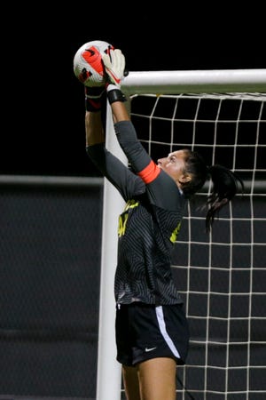 Purdue goalkeeper Marisa Bova (44) goes up for a save during the second half of an NCAA women's soccer game, Thursday, Sept. 30, 2021 at Folk Field in West Lafayette.