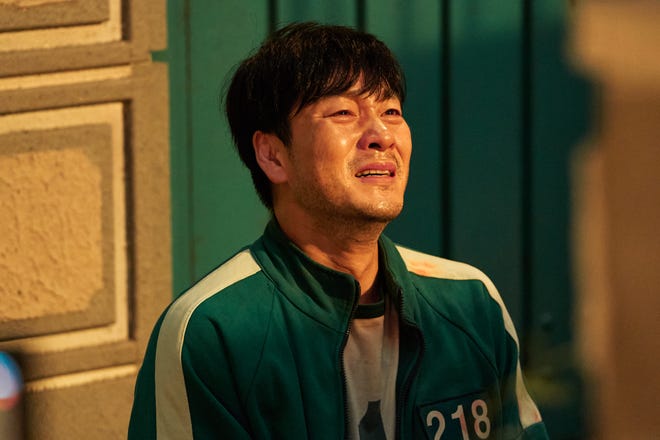 Park Hae-soo as Sang-woo in Netflix's "Squid Game." Sang-woo is another player caught in the deadly game, a banker who stole money and is in debt for millions.