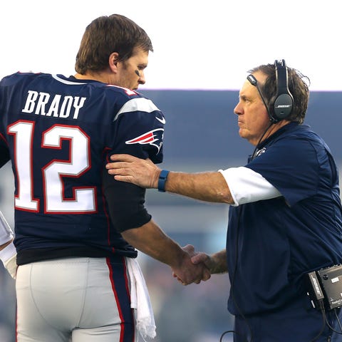 Tom Brady and head coach Bill Belichick of the New
