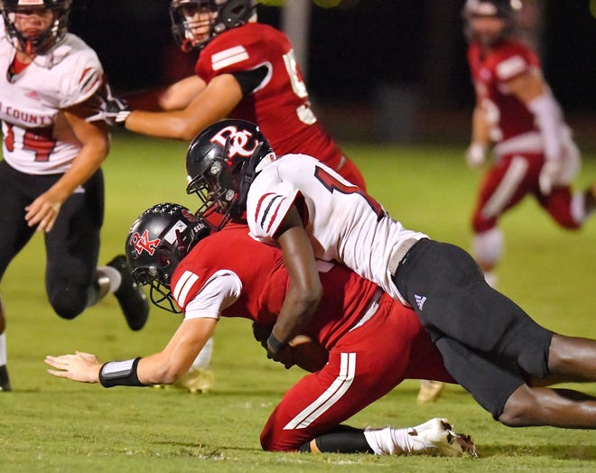 Baker County defensive end Orlando Holland is the Times-Union's Athlete of the Week after recording seven sacks in the regional football championship against Wakulla.