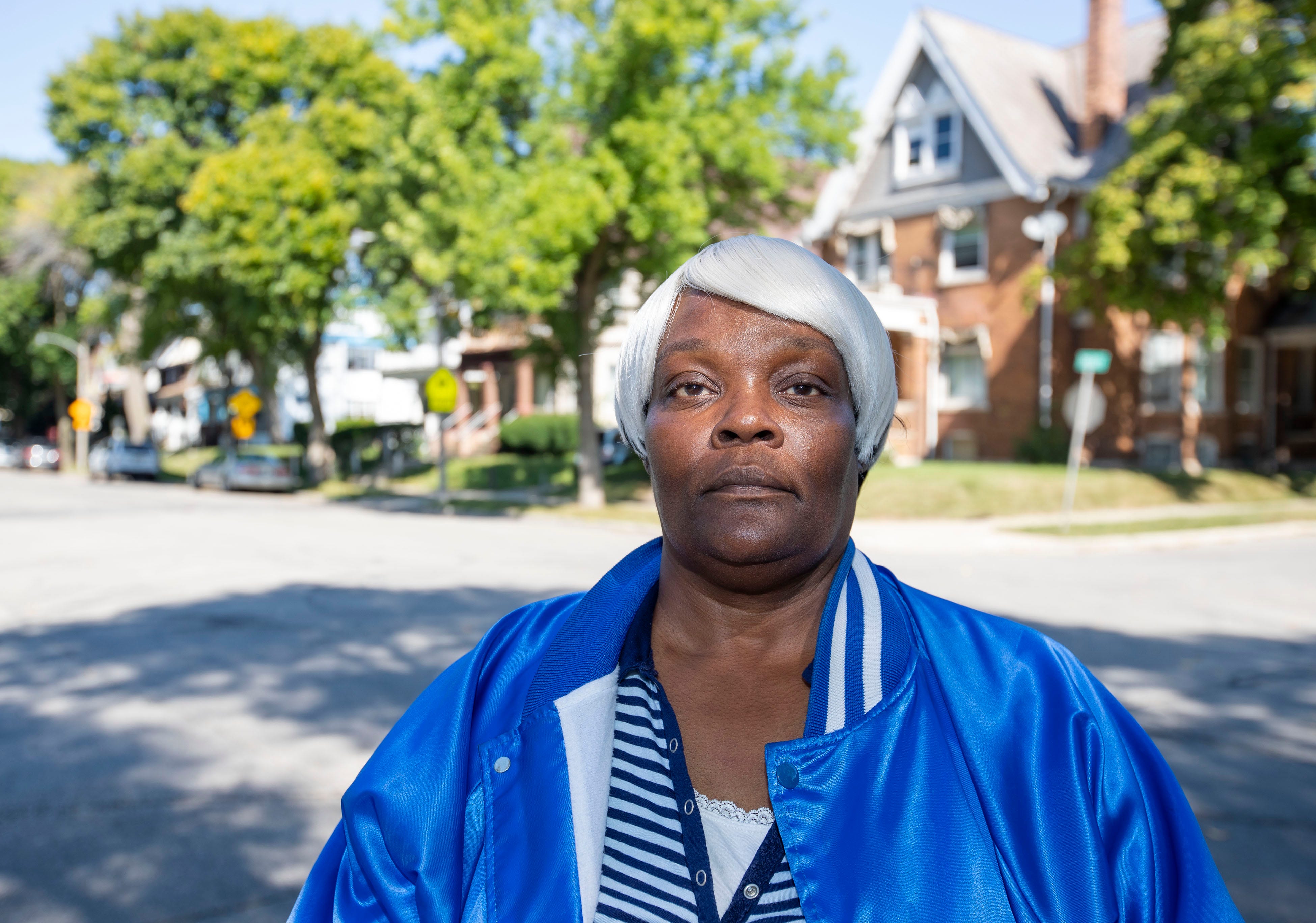 Sharyl MacFarland stands near her home in Milwaukee. MacFarland lives in Milwaukee’s 53206 ZIP code, where she and her brothers grew up. From her front porch, she can count down her block house after house where someone has been sent to prison. She includes her own house. All three of her sons have spent time behind bars; two of her brothers have been in prison for most of their lives.