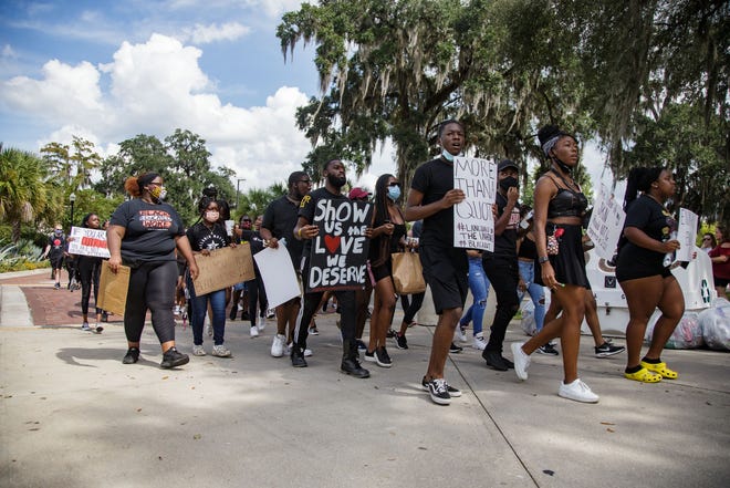 Florida State University Black Student Union members march across campus before the game against Syracuse requesting FSU provide diversity and inclusion curriculum, funding and more Saturday, Oct. 2, 2021.