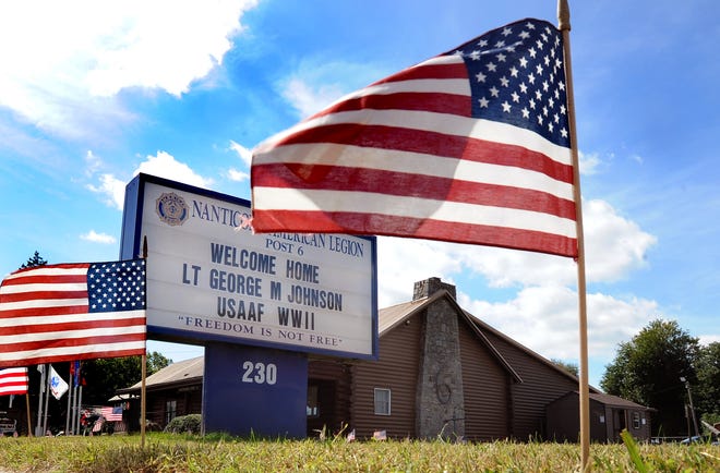 Sign honoring the return of Army Air Force 2nd Lt. George M. Johnson, of Seaford, who died 77 years ago during WW II.  GARY EMEIGH/Special To The News Journal