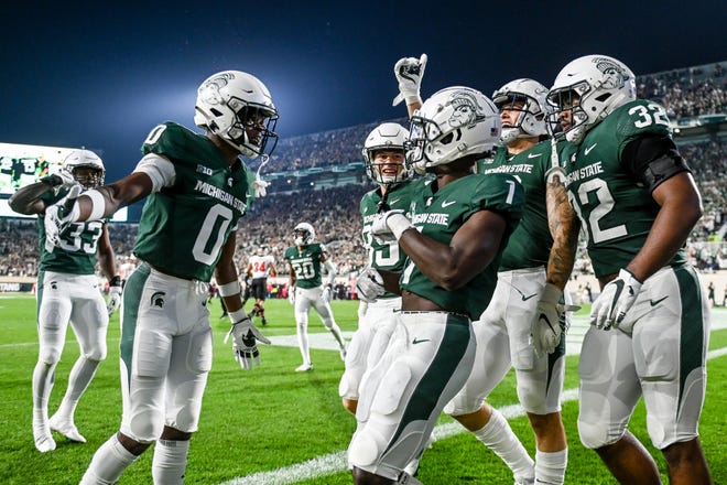 MSU will host Ohio State next season and travel to Michigan and Penn State. The Big Ten unveiled its 2022 football schedule on Wednesday.