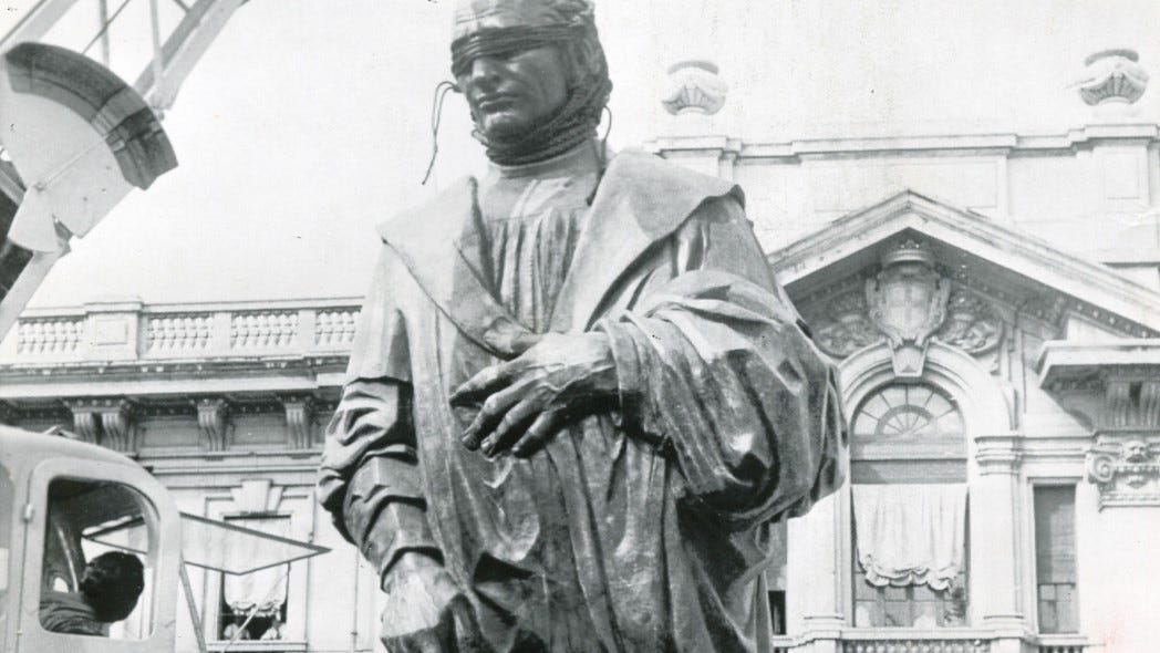 The Christopher Columbus statue is shown in Italy being readied for a trip aboard the Italian liner Cristoforo Colombo for shipment to the United States in 1955.