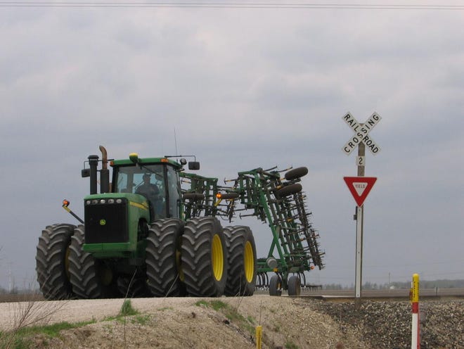 It’s important for farm equipment operators and other motorists to pay attention at railroad crossings and only cross the tracks when it’s safe.