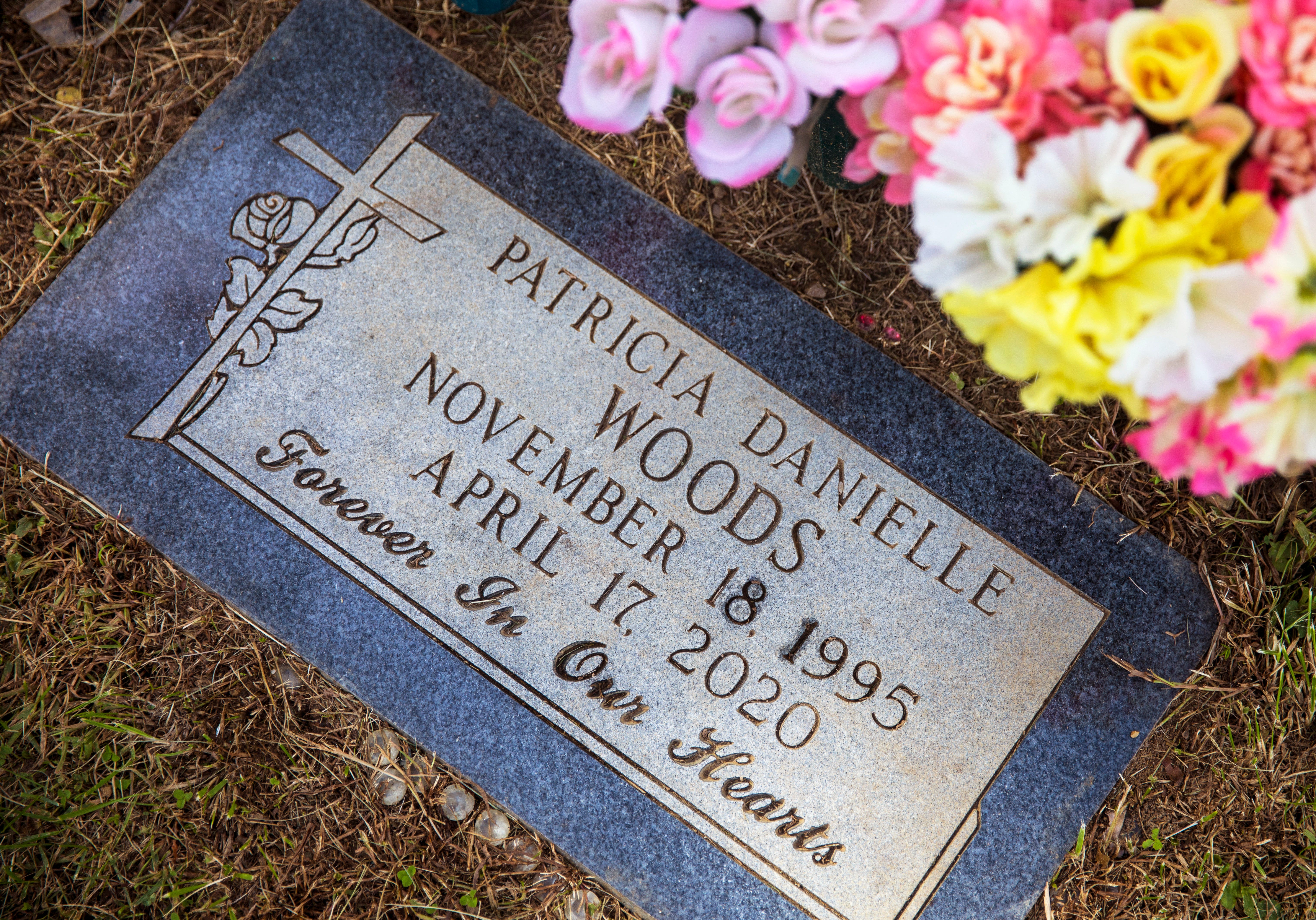 The marker for Patricia Woods, 24, at Cincinnati's Vine Street Hill Cemetery Sept. 30, 2021. She was killed April 17, 2020, in her Westwood apartment while her children, Kayden, then 5, and Kay-Lia, then 14 months, slept. Kayden fled to neighbors for help. Marcus Reed, who Woods was dating, is charged with aggravated murder.