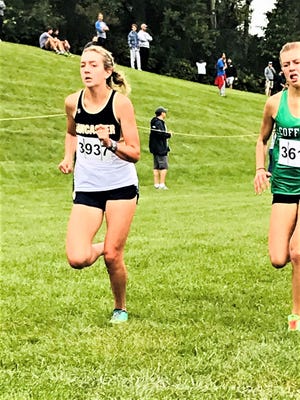 Lancaster junior Riley Spangler, shown running in an event earlier this season, was the Lady Gales' top runner during Saturday's Midwest Meet of Champions.