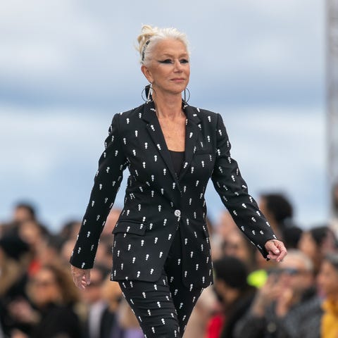 Actress Helen Mirren walks the runway during the "