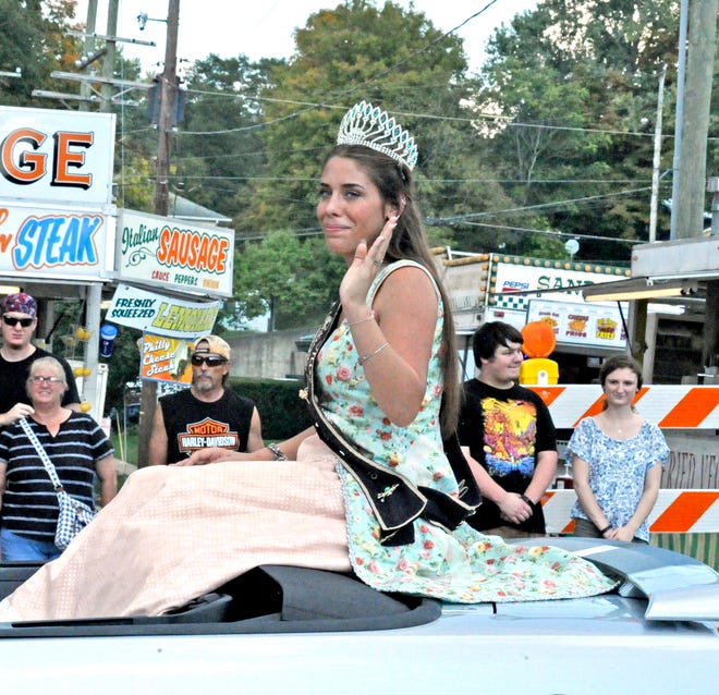 Antique Festival queen Mariah Loveday in the antique festival parade Sunday afternoon in MIllersburg.
