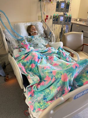 Tamara Drock is a COVID-19 patient at Palm Beach Gardens Medical Center, seen here on a ventilator. Her husband, Ryan, says Ivermectin cured his bout of COVID and wants a judge to order the hospital to provide it to his wife, over the objections of doctors.