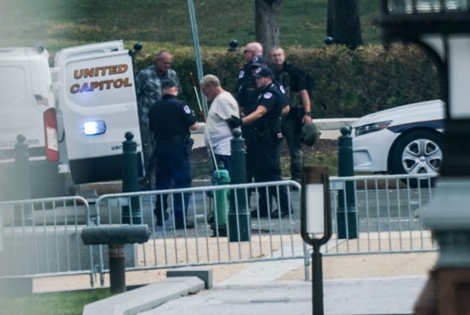 The U.S. Capitol Police respond to a suspicious vehicle and apprehend a suspect in front of the U.S. Supreme Court on Oct. 5, 2021. . Police identified the man as Dale Paul Melvin, 55, of Kimball, Mich.