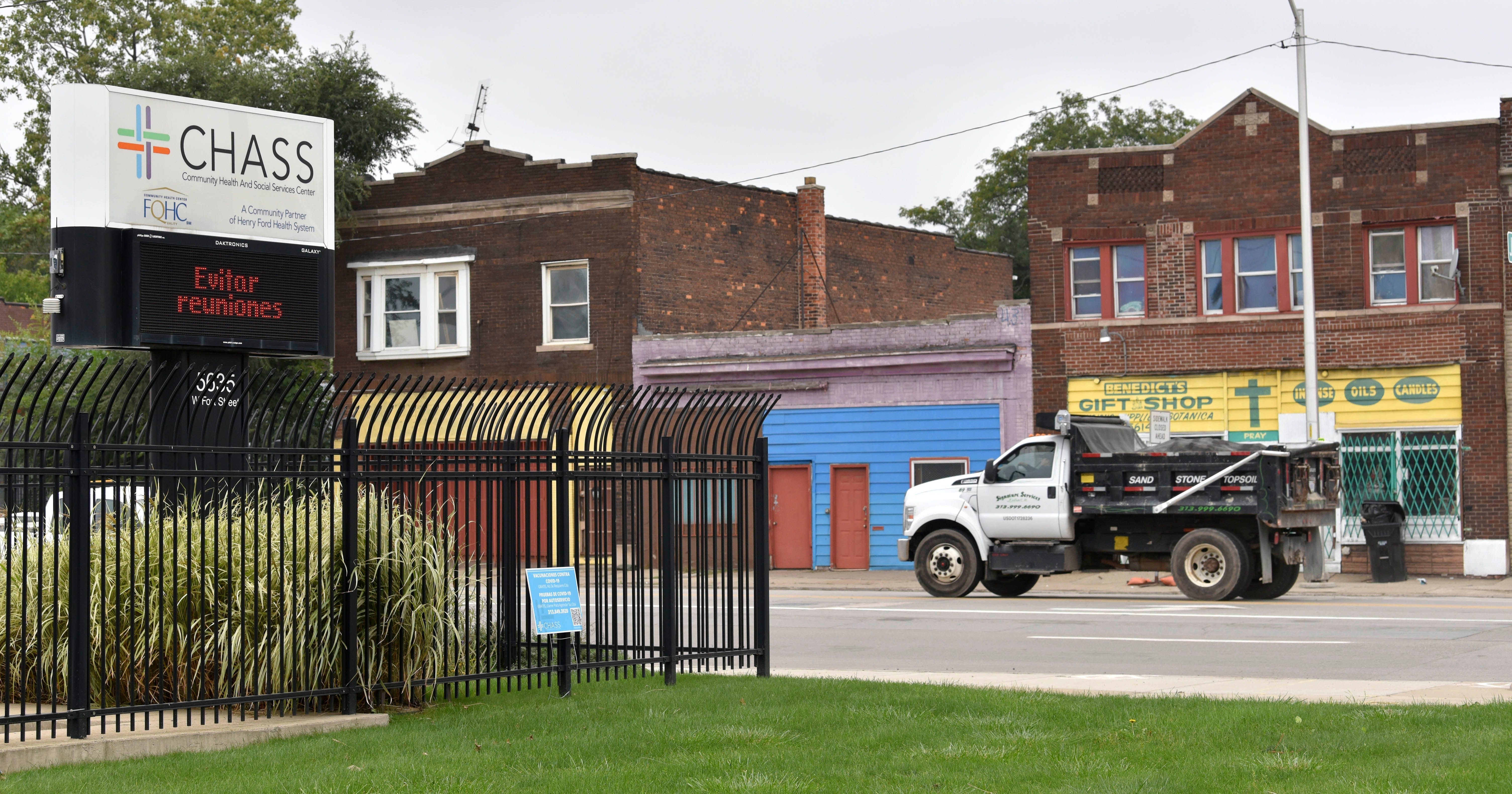 A construction crew passes the CHASS Center (Community Health and Social Services Center) on West Fort St. at Junction, Wednesday, Oct. 6, 2021.