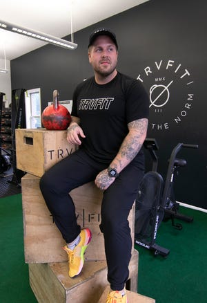 Tyler Koronich, founder of TRVFIT Fitness, reacquired a 9,000-square-foot gym in Genoa Township, shown Wednesday, Oct. 6, 2021.