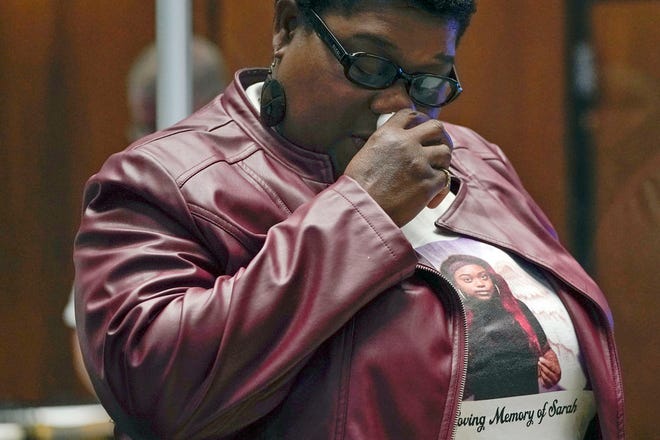 Laverne Butler, mother of Sarah Butler, wears a shirt with her daughter's picture as she gives a victim impact statement during the sentencing for Khalil Wheeler-Weaver in Newark, N.J., Wednesday, Oct. 6, 2021. Wheeler-Weaver, a New Jersey man who used dating apps to lure three women, including Sarah Butler, to their deaths and attempted to kill a fourth woman, five years ago was sentenced to 160 years in prison on Wednesday, as he defiantly proclaimed his innocence. (AP Photo/Seth Wenig, Pool)