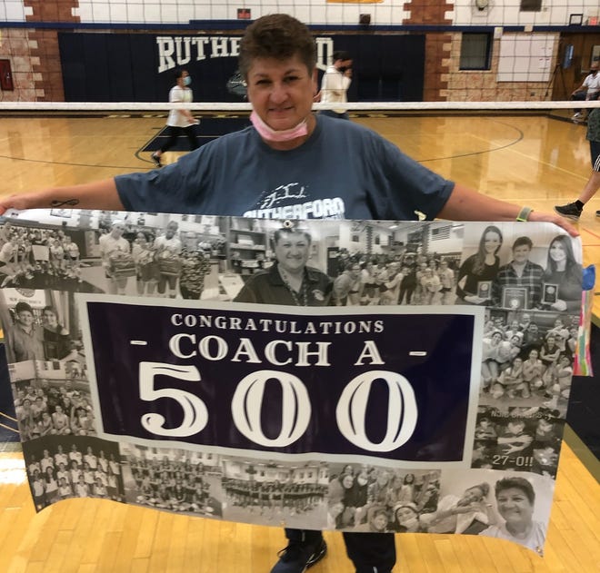 Rutherford girls volleyball coach Helen Antzoulides was presented with a banner commemorating her 500th career win after her Bulldogs defeated St. Mary, 2-0, in an NJIC match on Friday, Oct. 2, 2021.