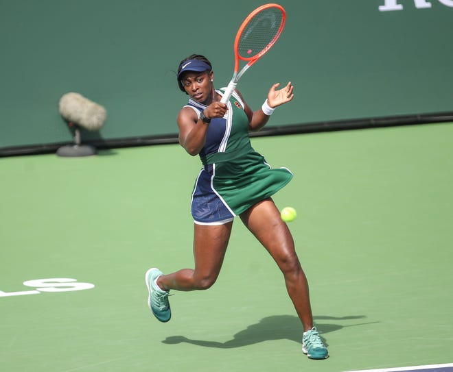 Sloane Stephens returns a shot during her match against Heather Watson at the BNP Paribas Open in Indian Wells, October 6, 2021.