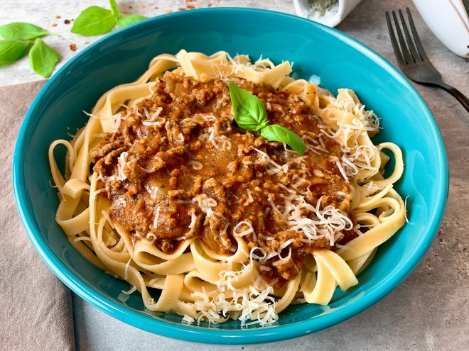 Fettuccine with Bolognese sauce is a hearty, cool weather classic.