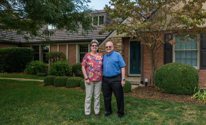 Todd Miller, 57, and Lisa Miller, 58, in front of their home in Sidney, Ohio.