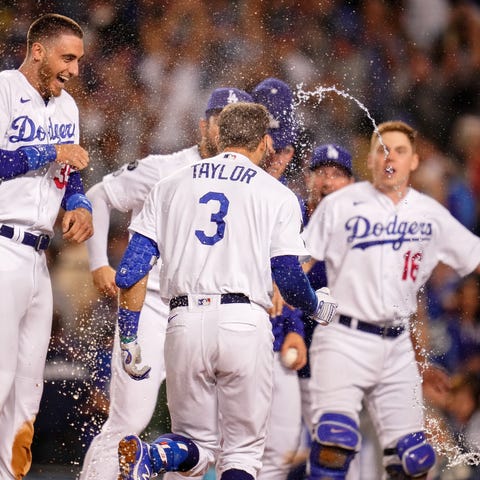 The Dodgers celebrate the walk-off two run home ru