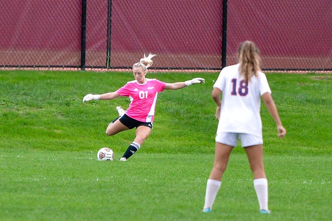 Bloomington South goalkeeper Arissa North (1) boots the ball upfield during Thursday's sectional semifinal match against Terre Haute North.