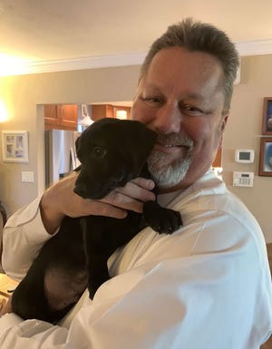 Vince Konidare, former Palm Beach Post manager, died of pneumonia from COVID-19. He was vaccinated.