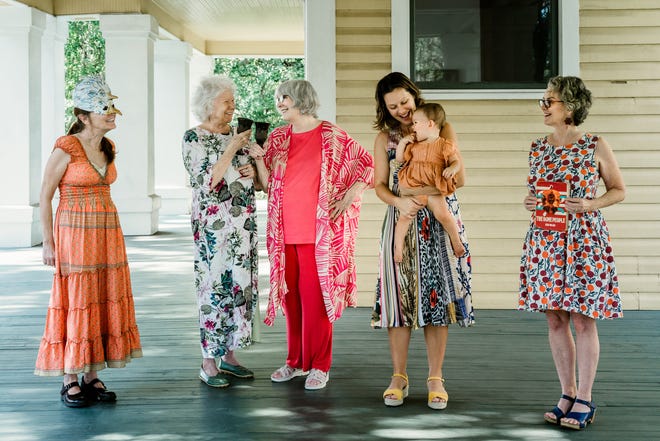 From left, Linda Hall, Eleanor Dietrich, Lynne Knight, Becki Rutta with daughter Eden, and Mary Jane Ryals put together the "Women Among Us" exhibit opening at LeMoyne on Oct. 14.