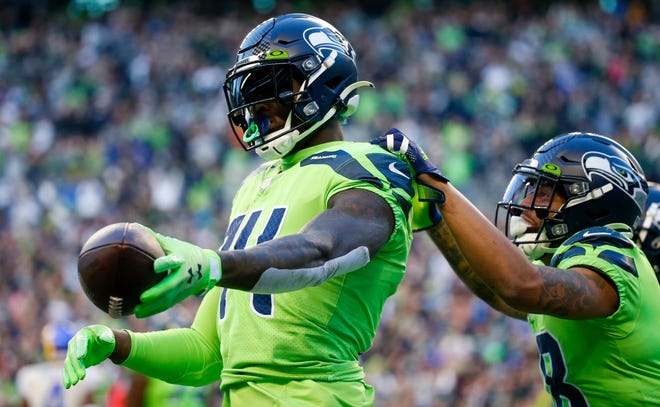 Seahawks wide receiver DK Metcalf celebrates a touchdown against the Los Angeles Rams earlier this season.