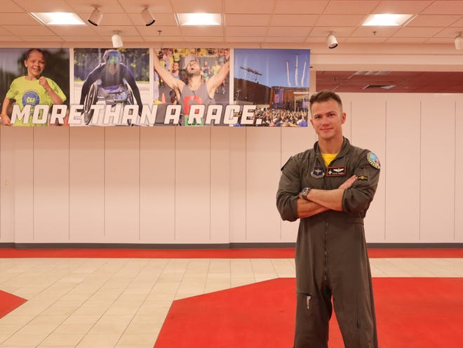 United States Air Force Major Nick Hanna, seen here at the Boilermaker Health and Wellness Expo Saturday, Oct. 9, 2021, will pilot one of two F-16 aircraft over the Boilermaker Post-Race Party Sunday.