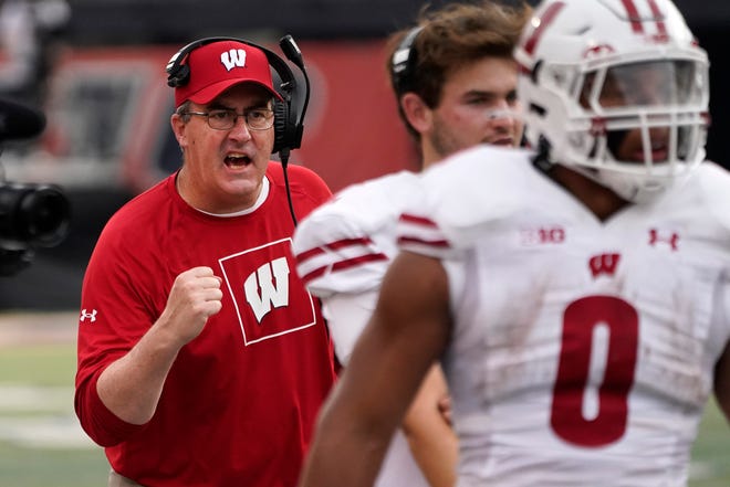 Wisconsin head coach Paul Chryst celebrates a touchdown during a victory over Illinois in October.