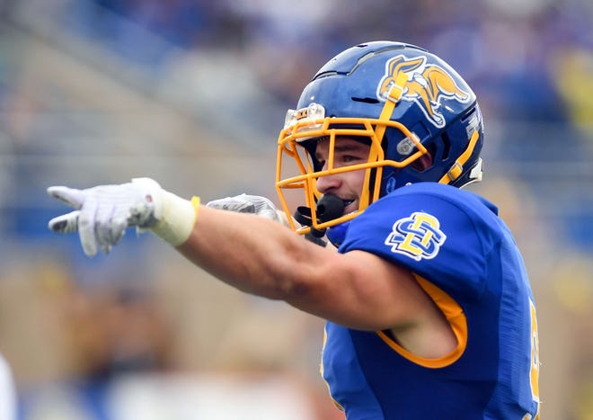South Dakota State's Jadon Janke smiles and points to his teammate after catching a long pass downfield on Saturday, October 9, 2021, at Dana J. Dykhouse Stadium in Brookings.