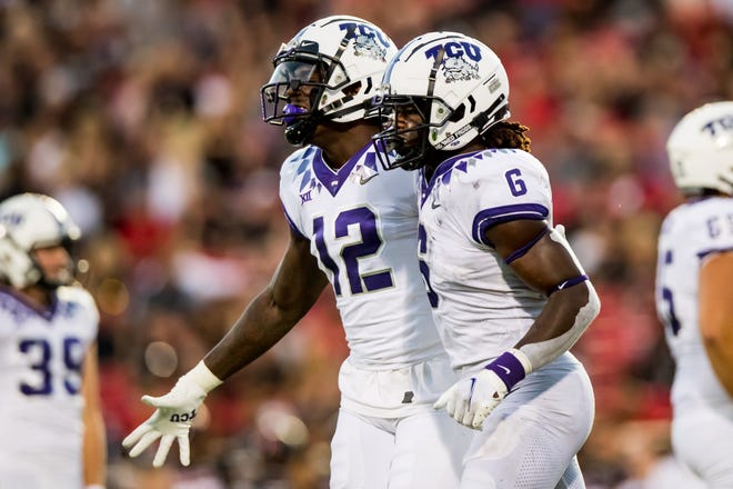 LUBBOC, TX - OCTOBER 09: TCU Horned Frogs #6 running back Zach Evans celebrates Geor'Quarius Spivey #12 tight end after touchdown in the first half of a college football game against the Texas Tech Red Raiders at Jones AT&T Stadium on October 09, 2021 in Lubbock , Texas.  (Photo by John E. Moore III/Getty Images) ORG XMIT: 775721576 ORIG FILE ID: 1345746831