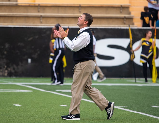 Southern Miss Golden Eagles head Coach Will Hall claps before a game against the UTEP Miners at M.M. Roberts Stadium in Hattiesburg, Miss., on Saturday, Oct. 9, 2021.